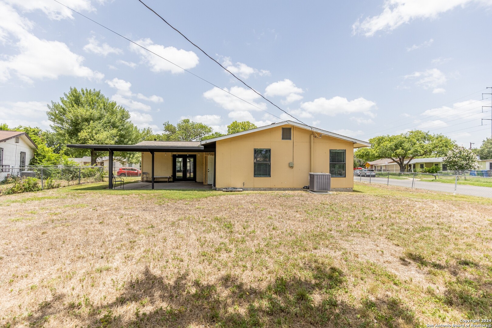 7802 Rimfire Drive San Antonio, TX 78227 - Photo 38 of 39 a view of a house with a yard and garage