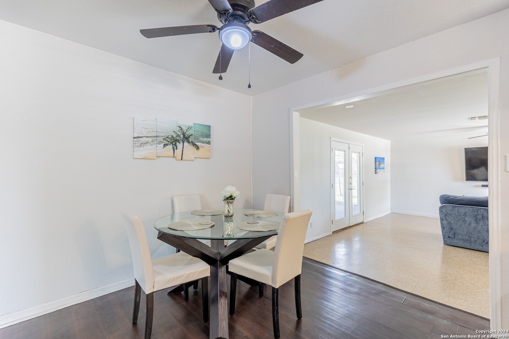 7802 Rimfire Drive San Antonio, TX 78227 - Photo 10 of 39 a view of a dining room with furniture and a chandelier fan