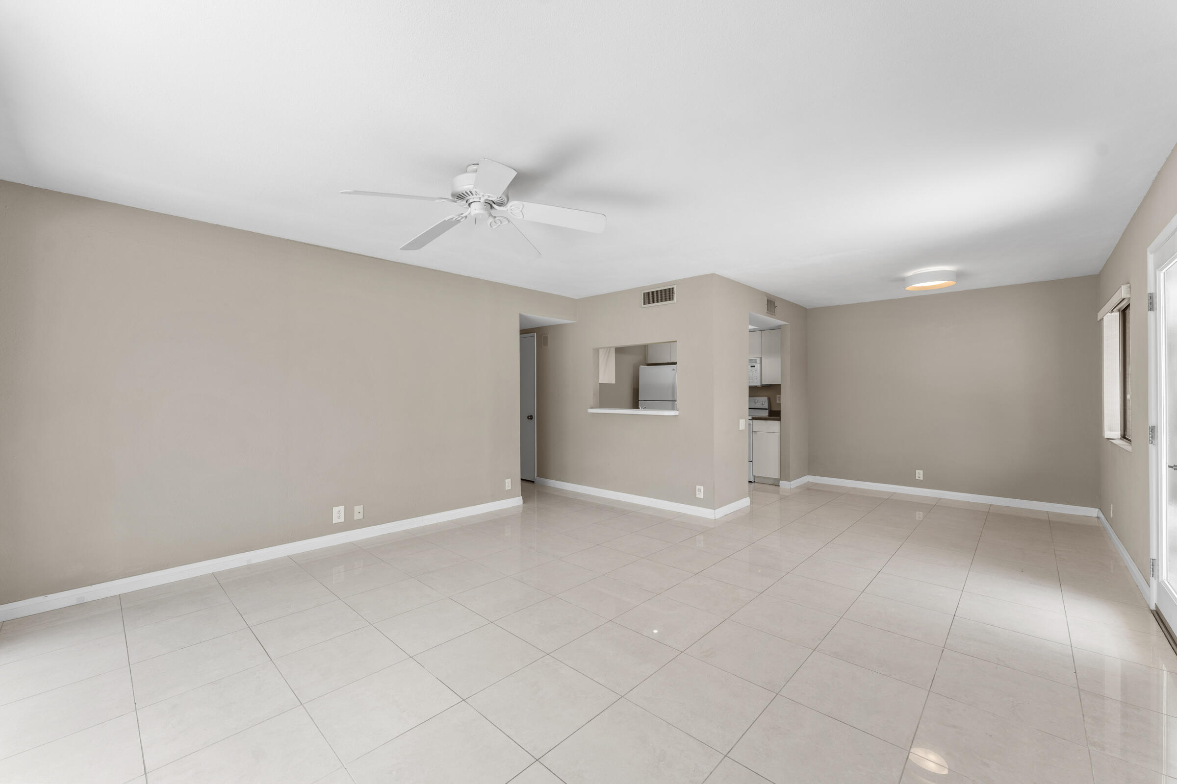 1111 East Ramon Road, Unit 75 Palm Springs, CA 92264 - Photo 10 of 35 Living And Dining lookint to Kitchen