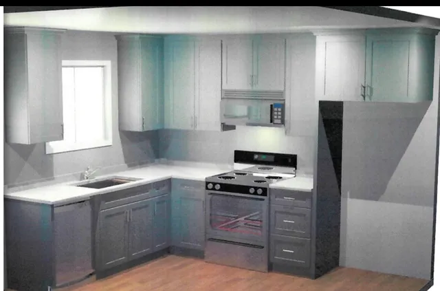 a kitchen with a sink stove and refrigerator