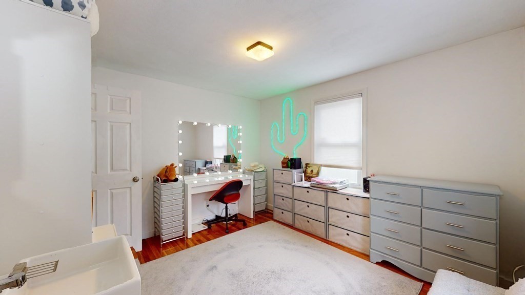 274 Cooper Street Springfield, MA 01108 - Photo 19 of 42 a room with furniture and window