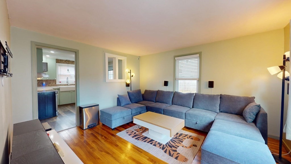 274 Cooper Street Springfield, MA 01108 - Photo 2 of 42 a living room with furniture and a couch