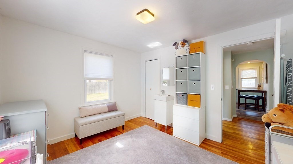 274 Cooper Street Springfield, MA 01108 - Photo 21 of 42 a view of a livingroom with furniture and a window