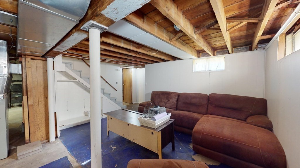 274 Cooper Street Springfield, MA 01108 - Photo 29 of 42 a work room with furniture and wooden floor