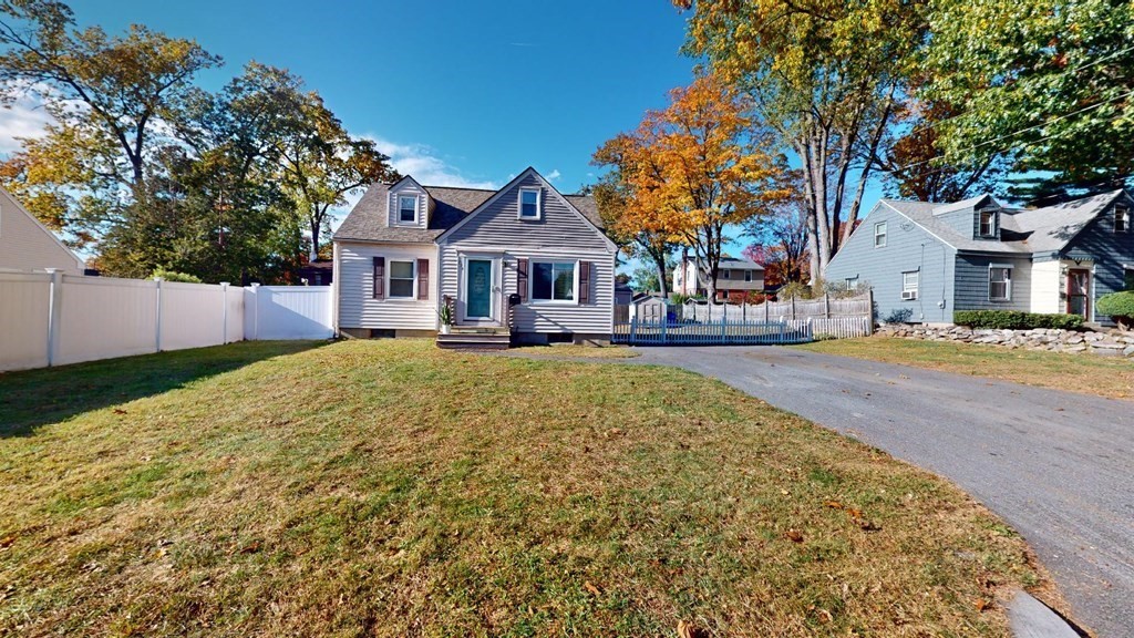 274 Cooper Street Springfield, MA 01108 - Photo 31 of 42 front view of a house with a yard
