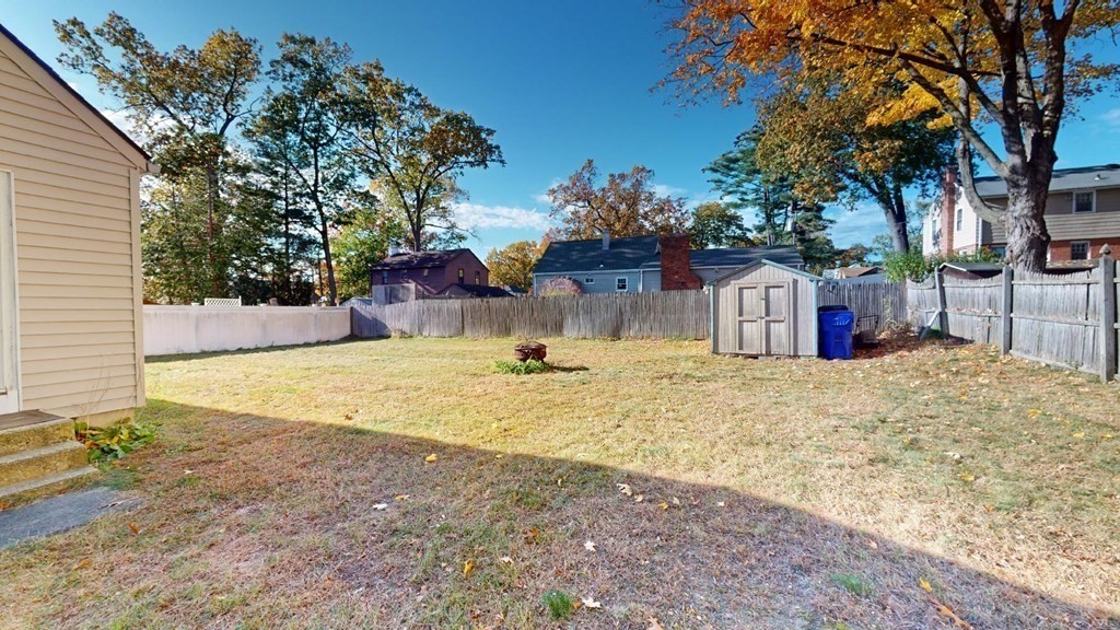 274 Cooper Street Springfield, MA 01108 - Photo 36 of 42 a swimming pool with outdoor seating and yard