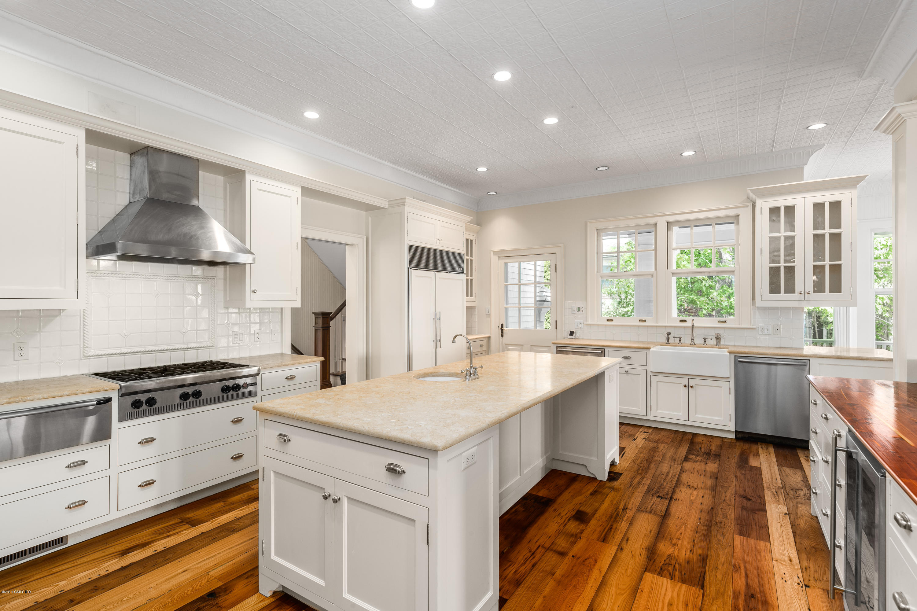 35 Byram Shore Road Greenwich, CT 06830 - Photo 12 of 32 a kitchen with a stove a sink and a refrigerator