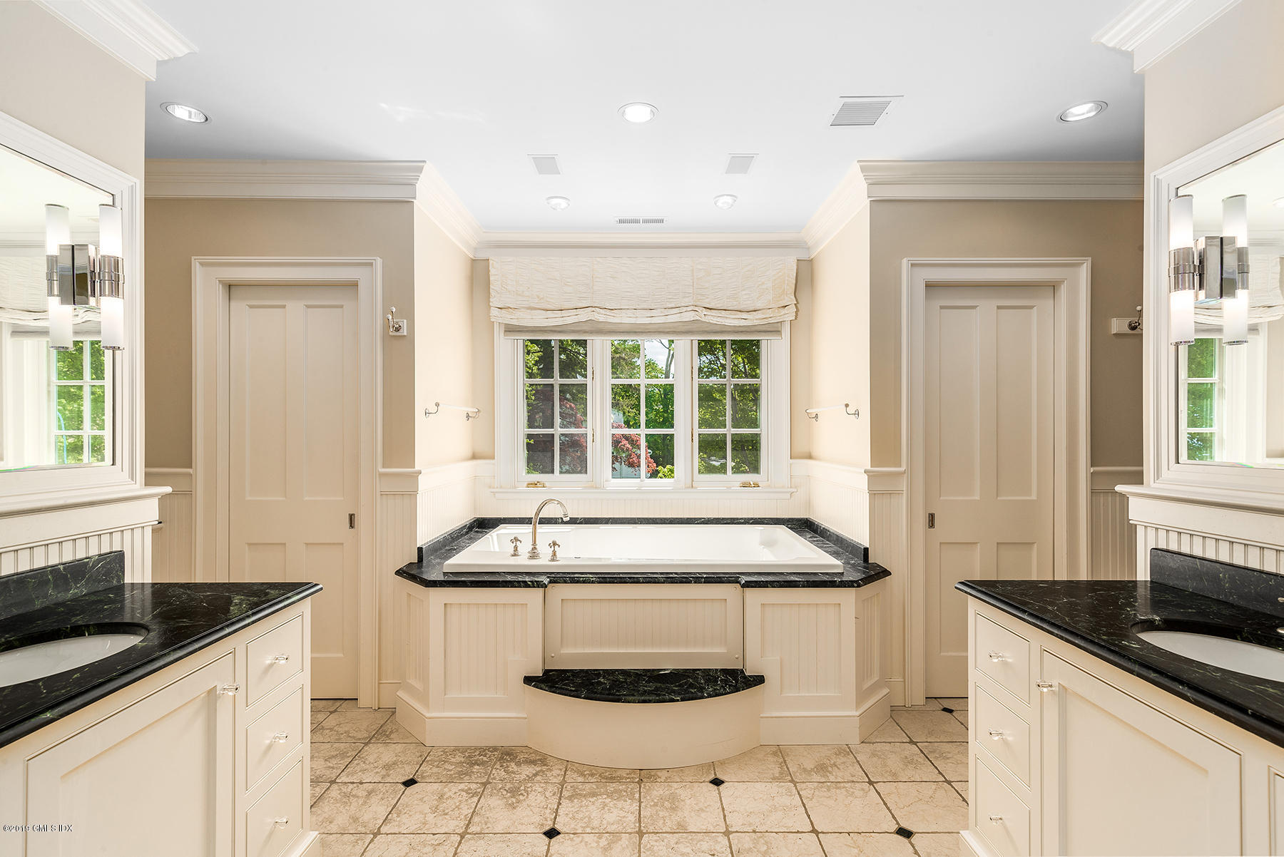 35 Byram Shore Road Greenwich, CT 06830 - Photo 21 of 32 a kitchen with granite countertop a sink and a stove