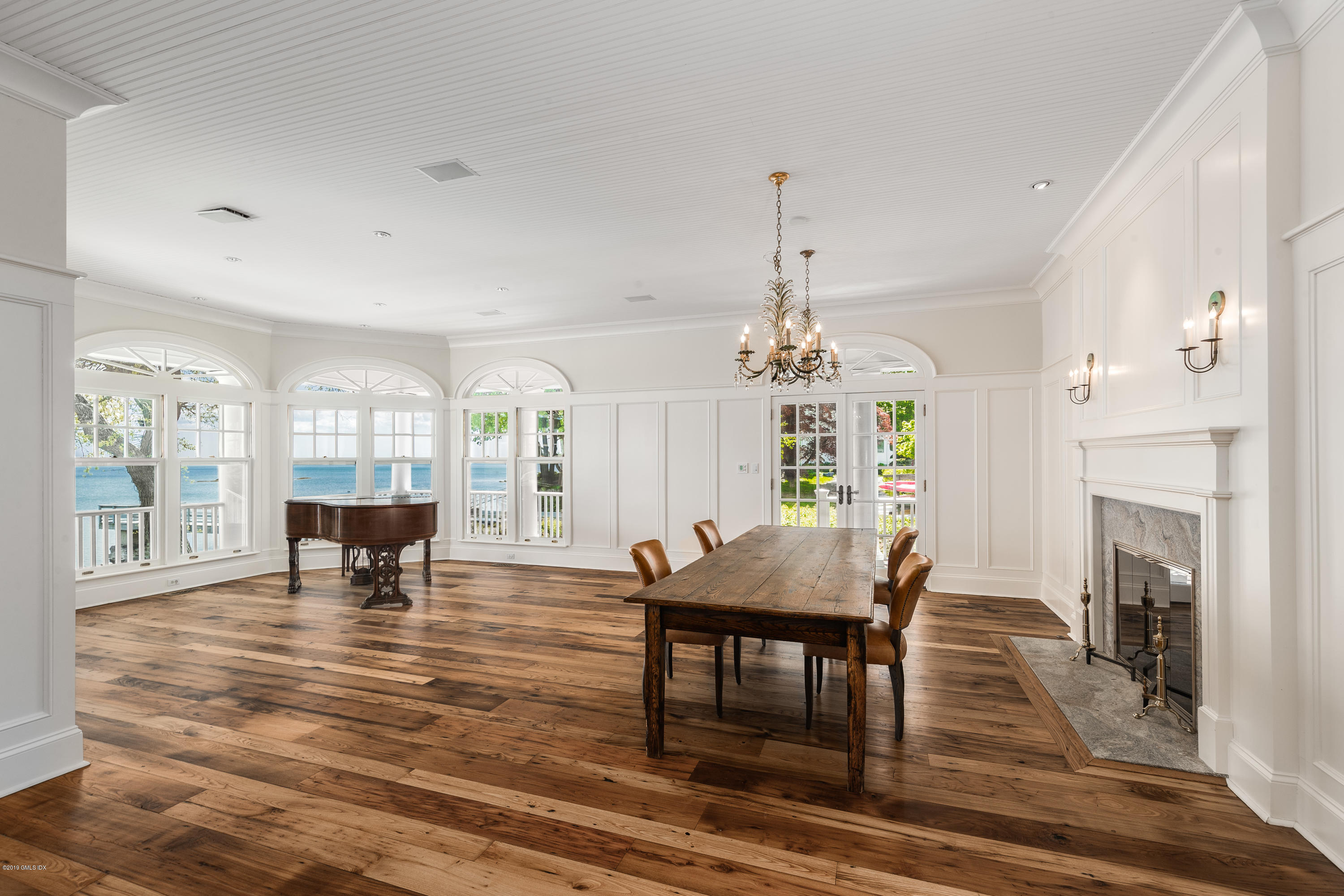 35 Byram Shore Road Greenwich, CT 06830 - Photo 9 of 32 a view of a dining room with furniture window and wooden floor