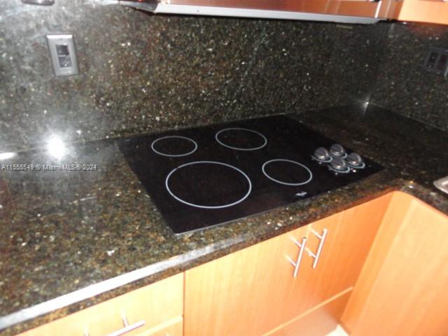 7928 Harding Avenue, Unit 8 Miami Beach, FL 33141 - Photo 25 of 30 a bathroom with a sink and a mirror