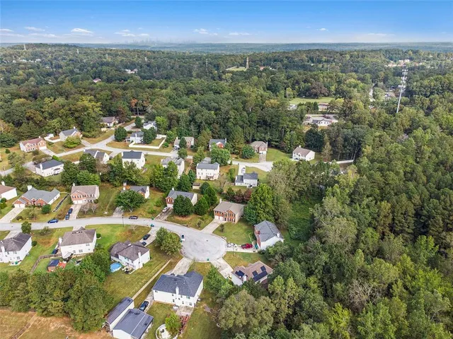 a view of a garden with a fountain
