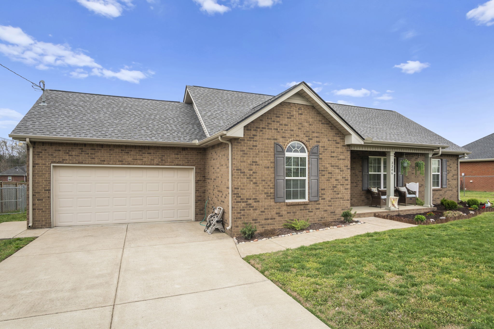 3306 Barretts Ridge Drive Murfreesboro, TN 37130 - Photo 1 of 24 a front view of a house with garden