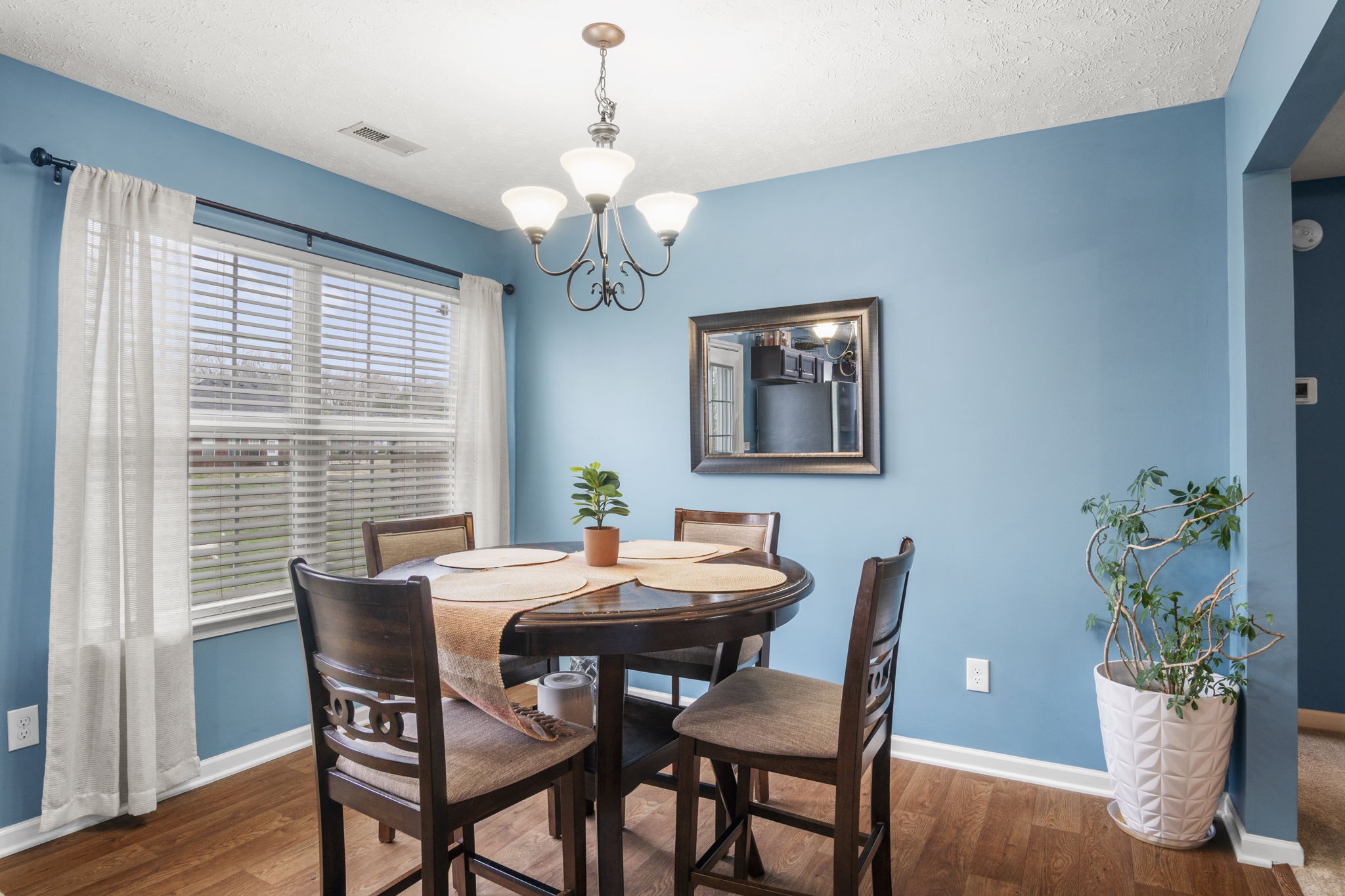 3306 Barretts Ridge Drive Murfreesboro, TN 37130 - Photo 13 of 24 a view of a dining room with furniture window and wooden floor