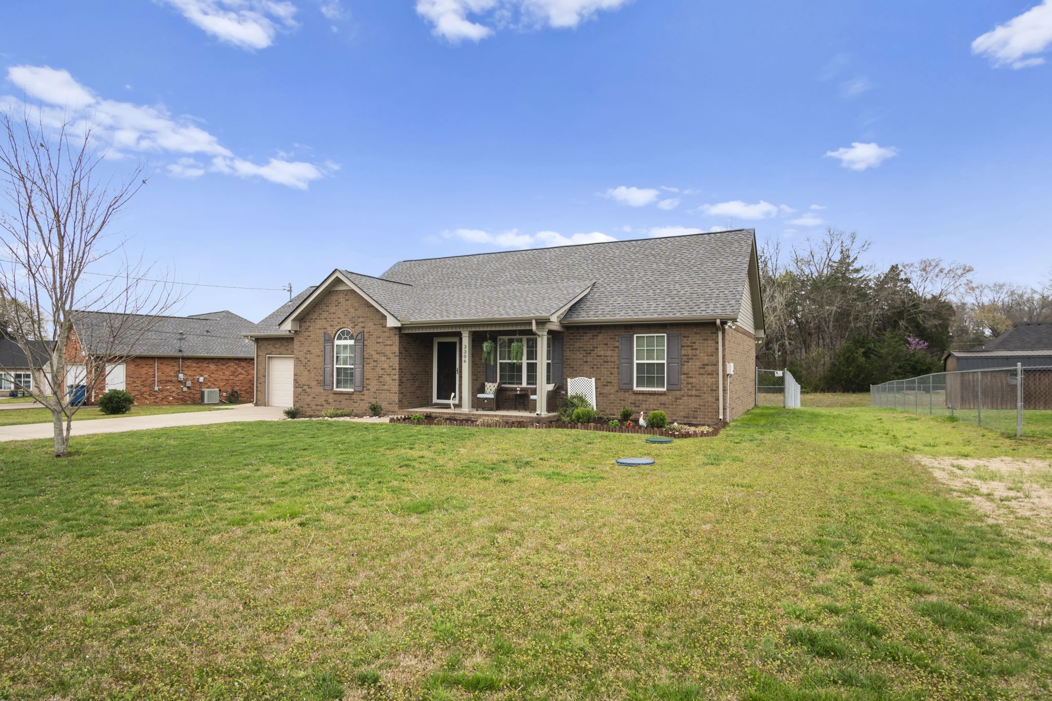 3306 Barretts Ridge Drive Murfreesboro, TN 37130 - Photo 2 of 24 front view of a house with a yard