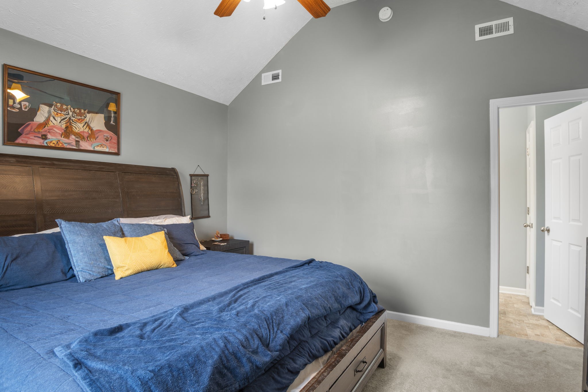 3306 Barretts Ridge Drive Murfreesboro, TN 37130 - Photo 22 of 24 a bed sitting in a bedroom next to a lamp