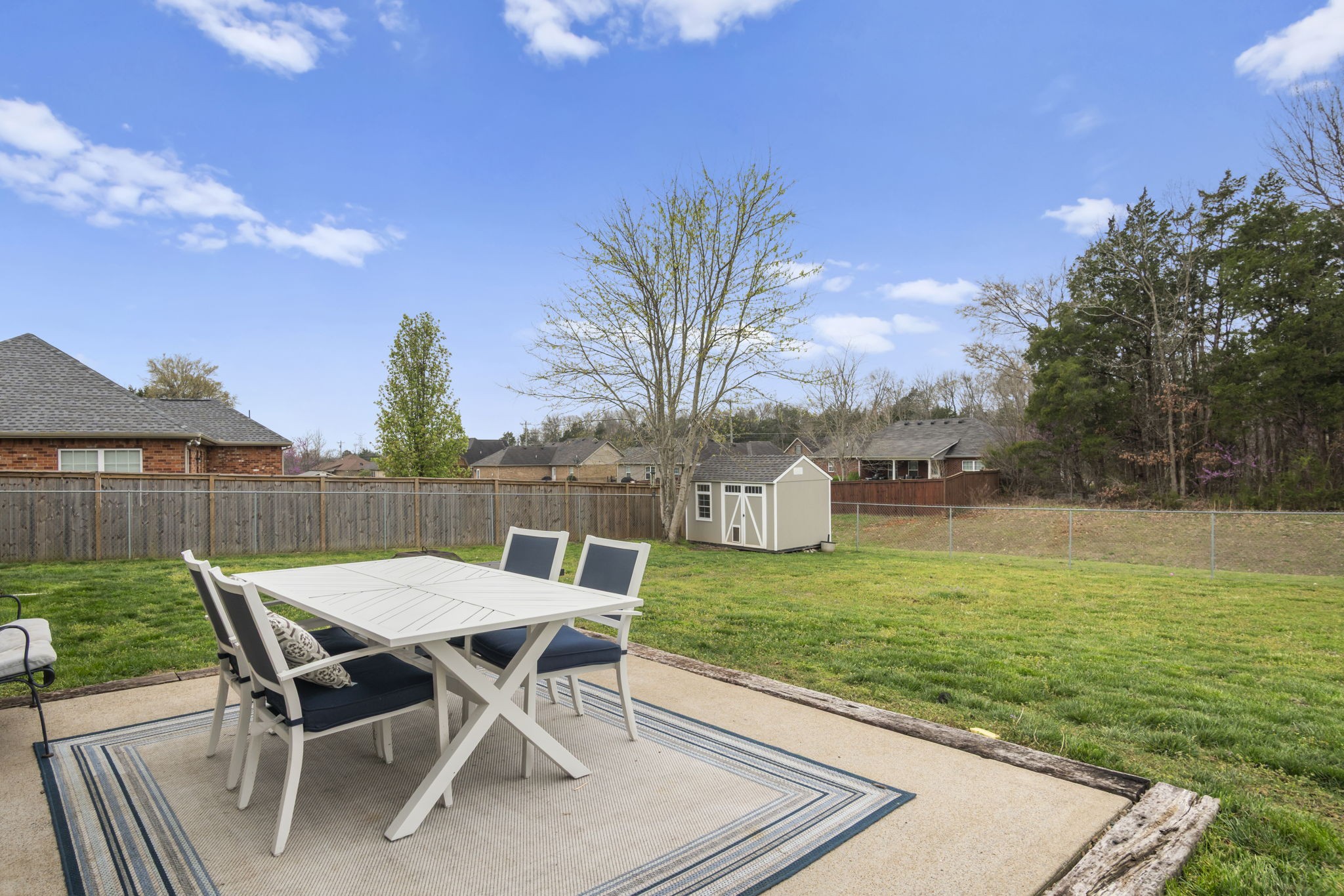 3306 Barretts Ridge Drive Murfreesboro, TN 37130 - Photo 8 of 24 a view of a backyard with a garden and seating area