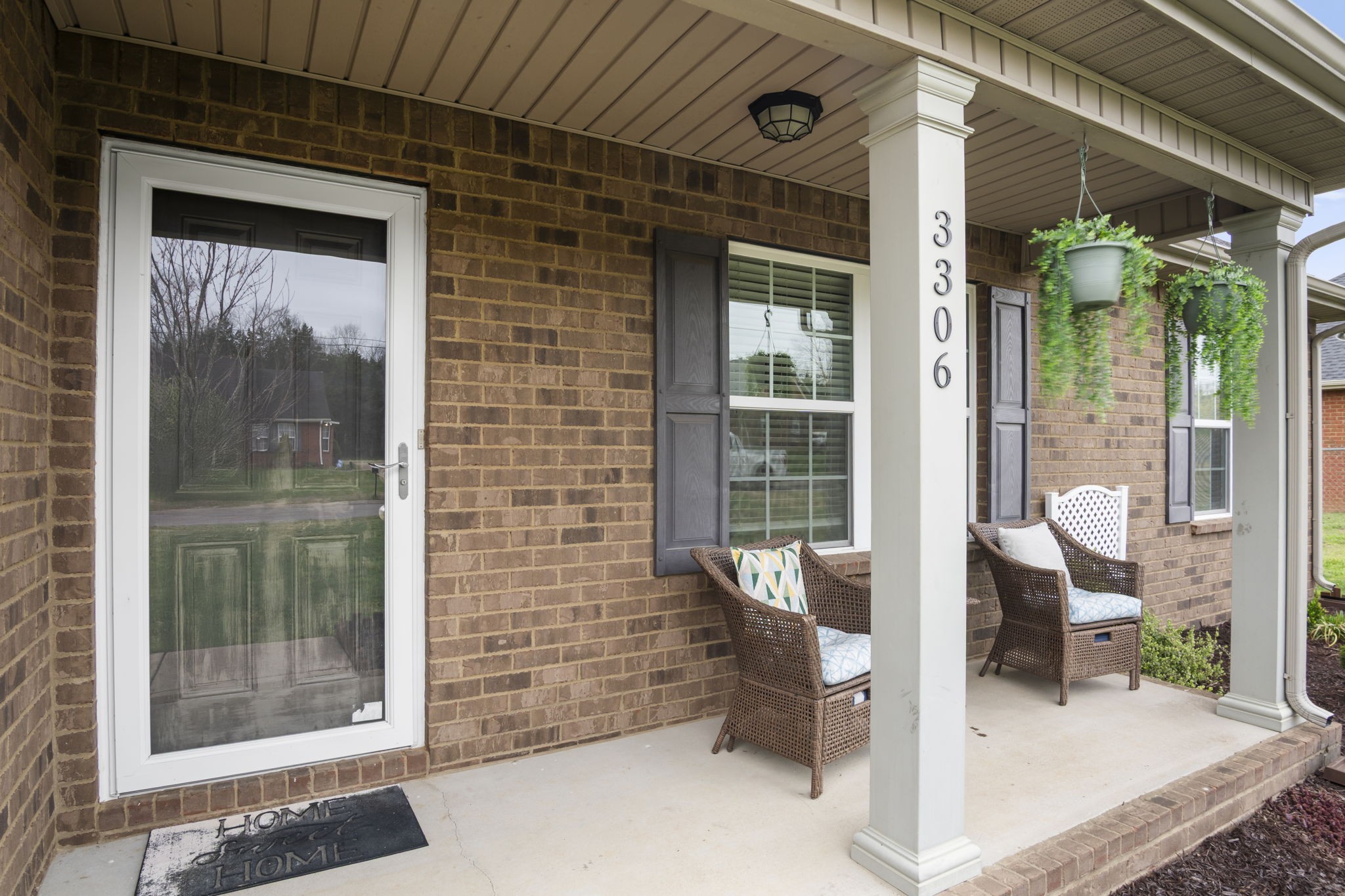 3306 Barretts Ridge Drive Murfreesboro, TN 37130 - Photo 9 of 24 a view of a patio with table and chairs and potted plants