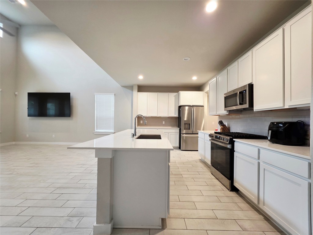 13022 Mid Stocket Drive Humble, TX 77346 - Photo 8 of 17 Kitchen Opens to Living & Dinning Areas