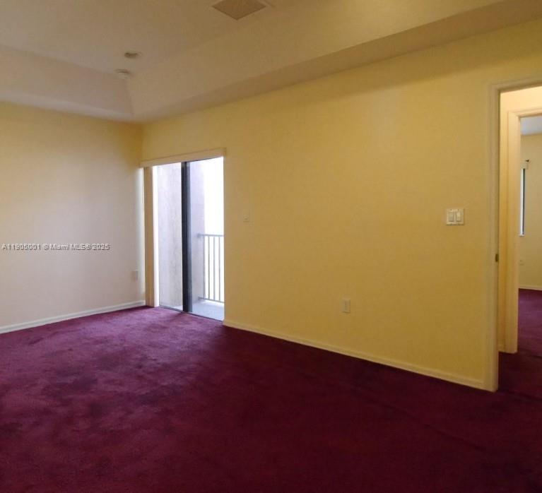 22911 Southwest 88th Place, Unit 521 Cutler Bay, FL 33190 - Photo 9 of 11 an empty room with a window