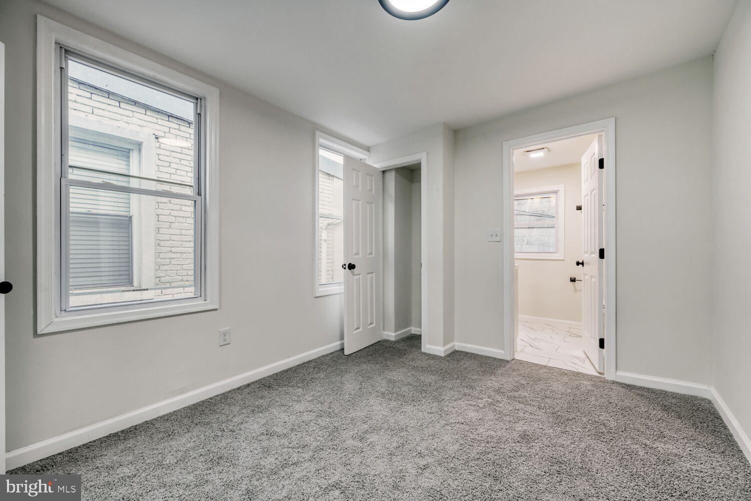 402 South Eaton Street Baltimore, MD 21224 - Photo 11 of 23 Bright and airy room with fresh finishes.