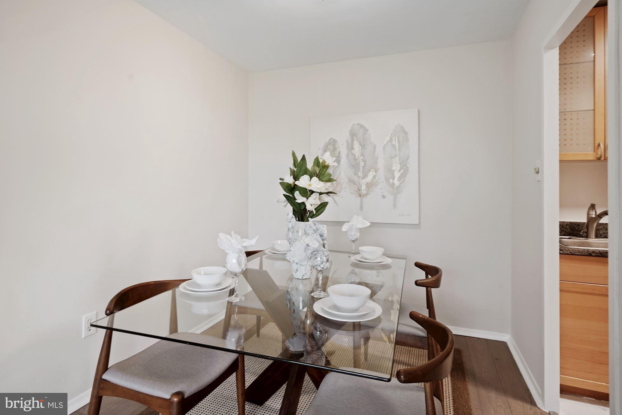 4000 Tunlaw Road Northwest, Unit 1123 Washington, DC 20007 - Photo 13 of 31 a view of a dining room with furniture