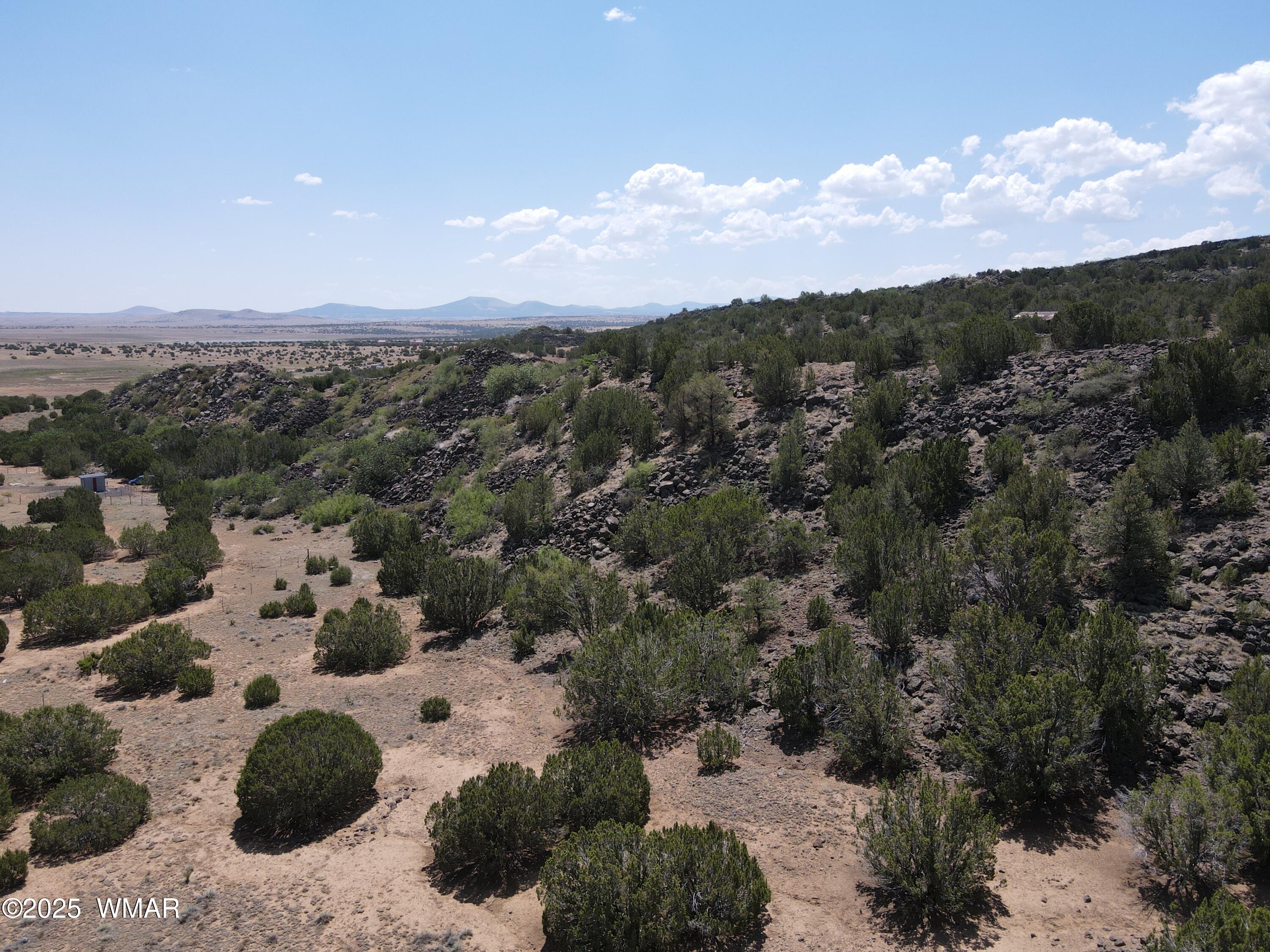 5 County Road Concho, AZ 85924 - Photo 1 of 15 a view of a lake with mountains in the background