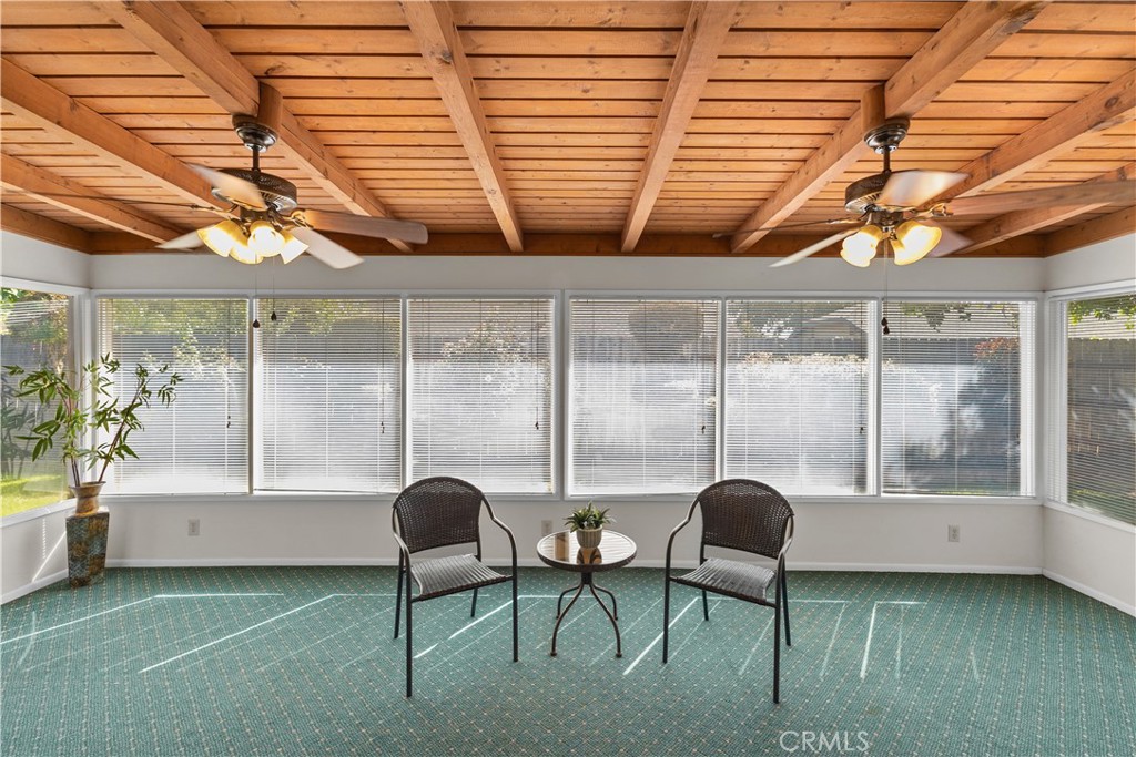 1157 West Orchard Street Rialto, CA 92376 - Photo 17 of 38 a living room with furniture and a large window