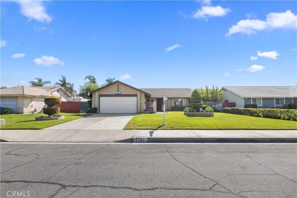 1157 West Orchard Street Rialto, CA 92376 - Photo 2 of 38 a view of house with outdoor space and street view