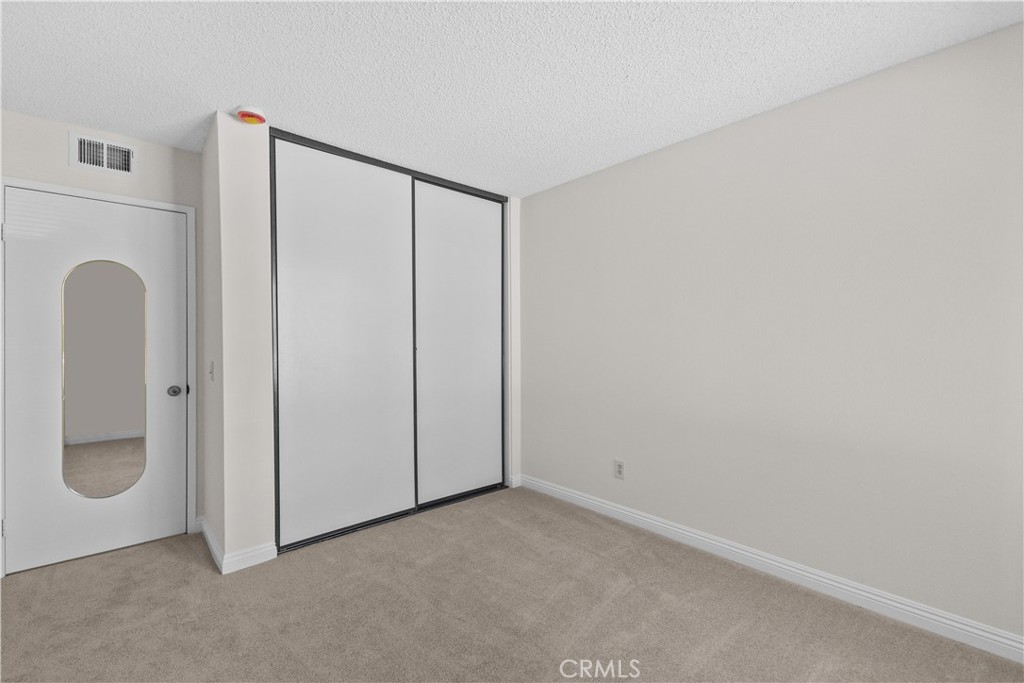 1157 West Orchard Street Rialto, CA 92376 - Photo 22 of 38 a view of a small space with sliding door