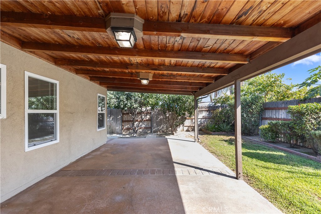 1157 West Orchard Street Rialto, CA 92376 - Photo 30 of 38 a view of a porch with furniture and garden