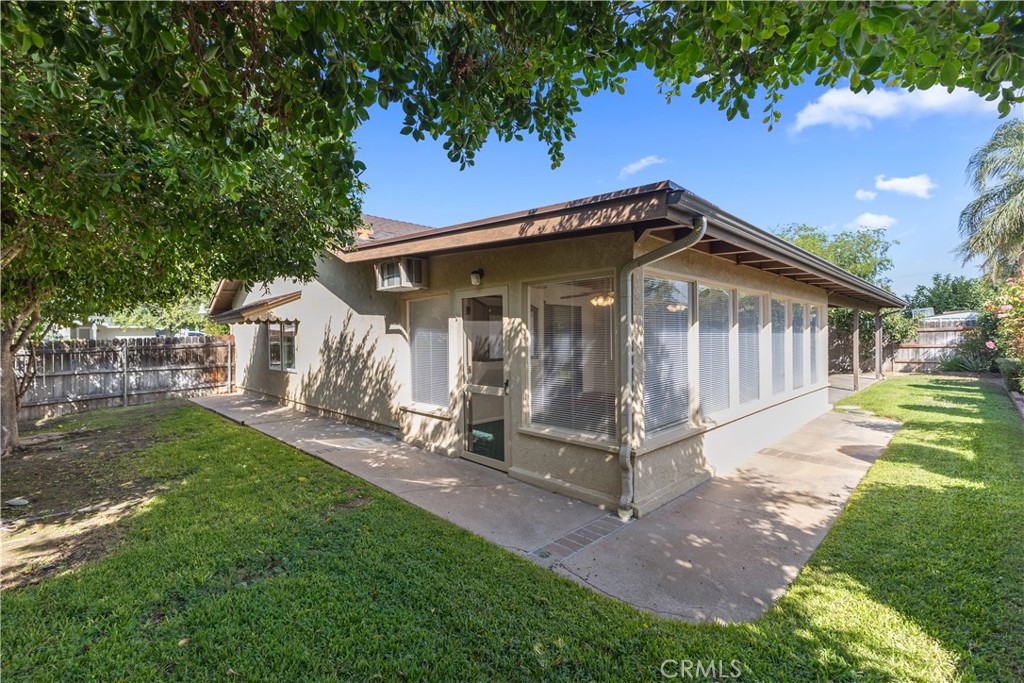 1157 West Orchard Street Rialto, CA 92376 - Photo 34 of 38 a front view of a house with a yard