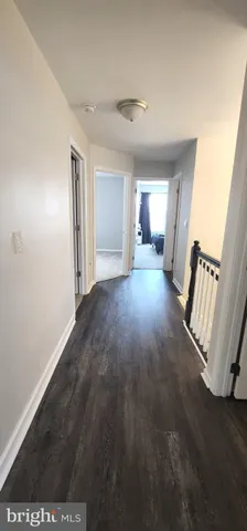 a view of a livingroom with wooden floor