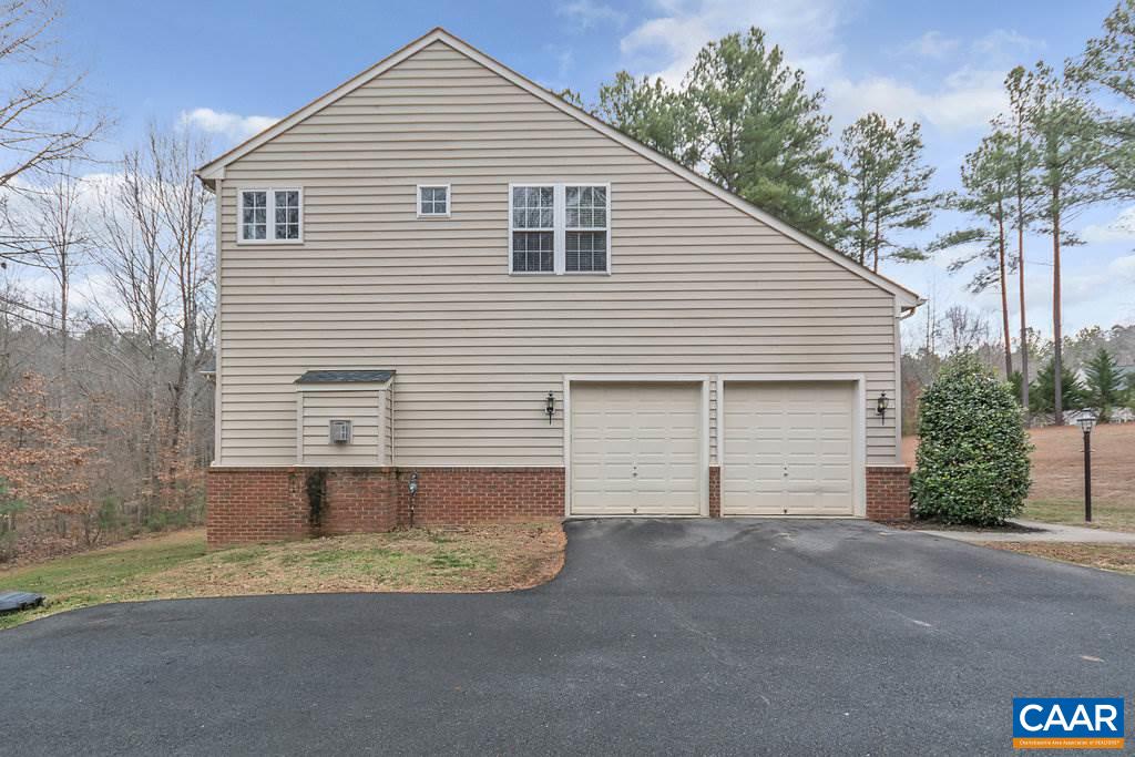 437 Willow Ridge Road Troy, VA 22974 - Photo 40 of 45 a view of a house with a yard and garage