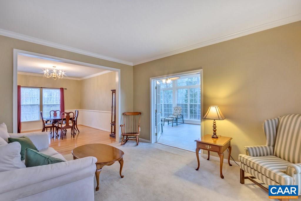 437 Willow Ridge Road Troy, VA 22974 - Photo 5 of 45 a living room with furniture and a table