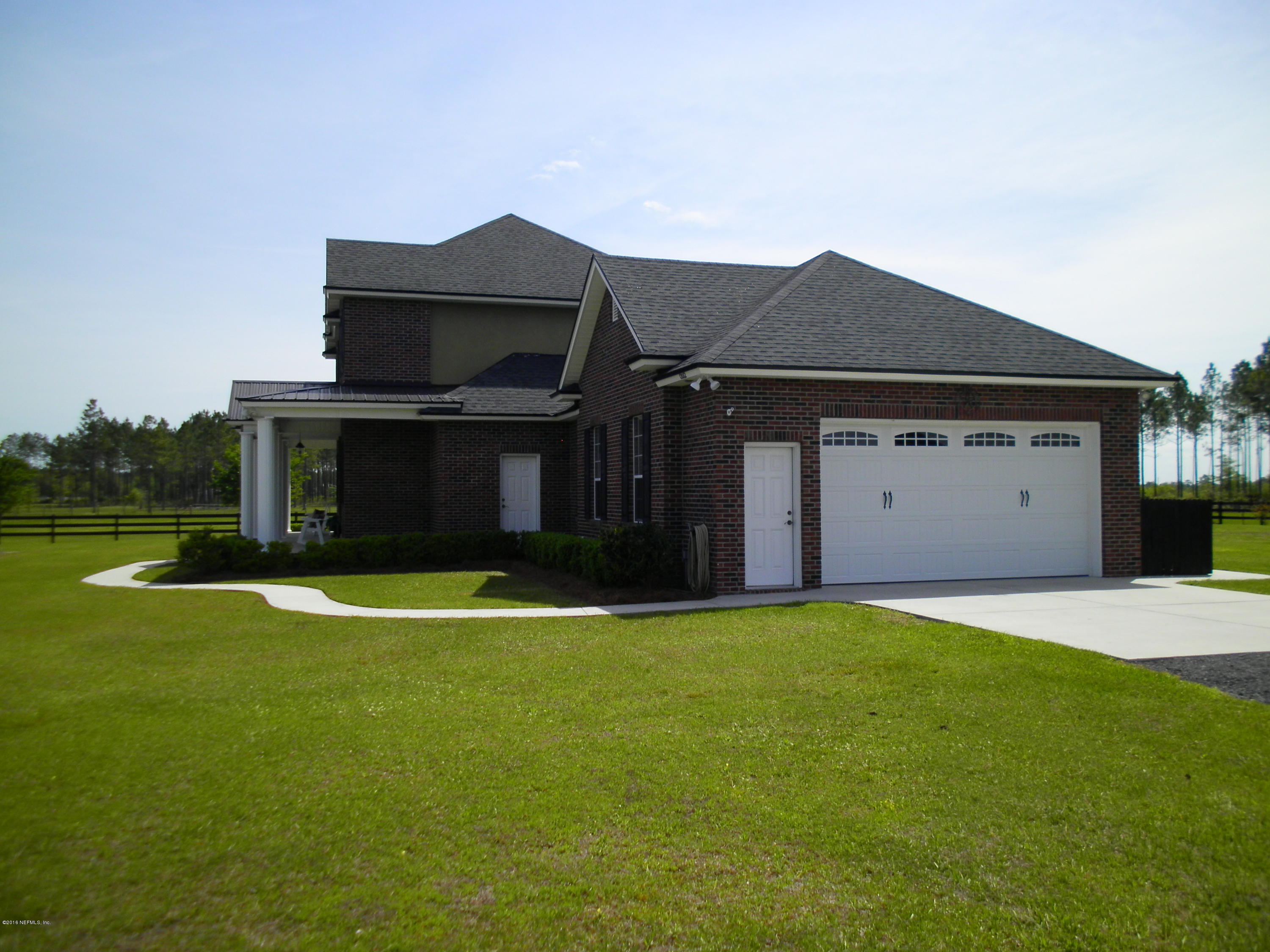 12082 Folsom Road Sanderson, FL 32087 - Photo 3 of 33 Garage side