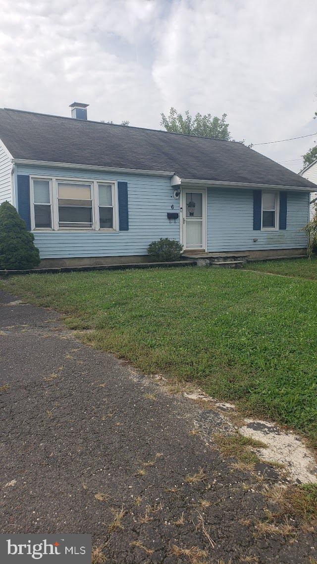 6 Pointville Road Pemberton, NJ 08068 - Photo 1 of 6 a front view of a house with garden