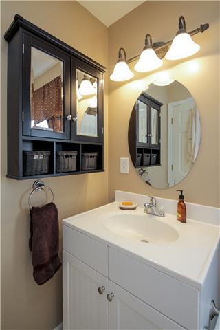 3612 Mahlon Moore Road Spring Hill, TN 37174 - Photo 13 of 20 a en suite bathroom with a sink and a mirror