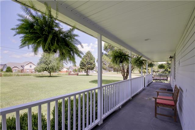 3612 Mahlon Moore Road Spring Hill, TN 37174 - Photo 2 of 20 a view of a balcony with lake view and a potted plant