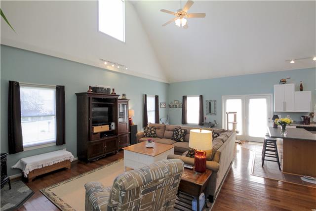 3612 Mahlon Moore Road Spring Hill, TN 37174 - Photo 3 of 20 a living room with furniture and a flat screen tv