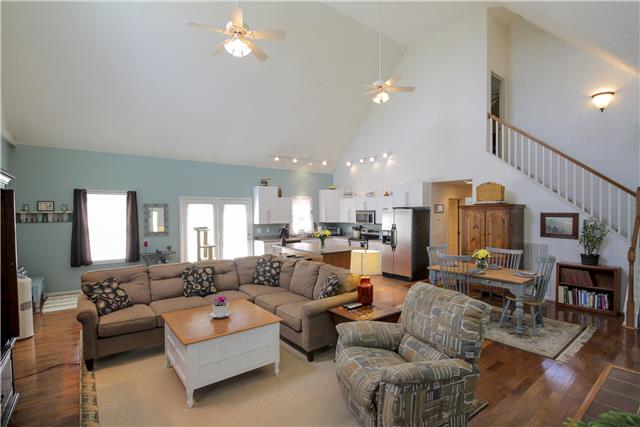 3612 Mahlon Moore Road Spring Hill, TN 37174 - Photo 5 of 20 a living room with furniture and a chandelier