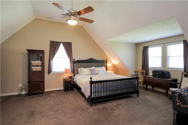 3612 Mahlon Moore Road Spring Hill, TN 37174 - Photo 10 of 20 a bedroom with bed and window