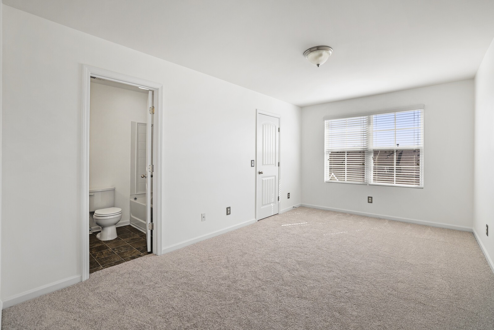 3946 Hoggett Ford Road Hermitage, TN 37076 - Photo 21 of 28 a view of empty room with white walls and bathroom