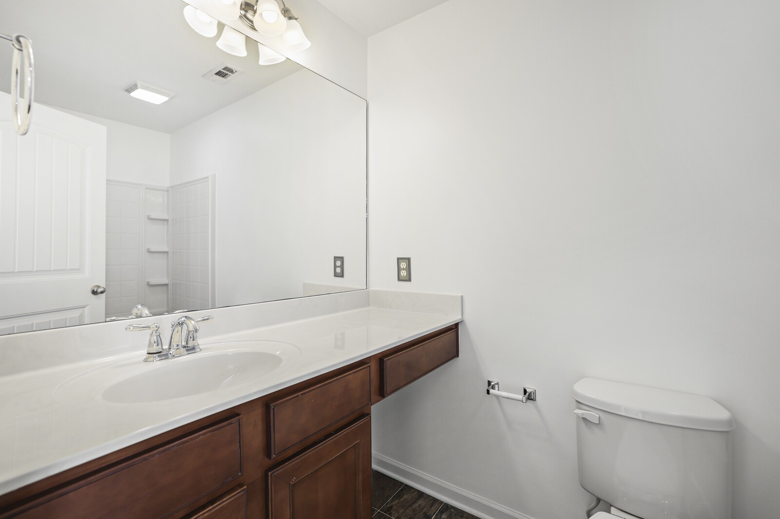 3946 Hoggett Ford Road Hermitage, TN 37076 - Photo 22 of 28 a bathroom with a sink a toilet and a mirror