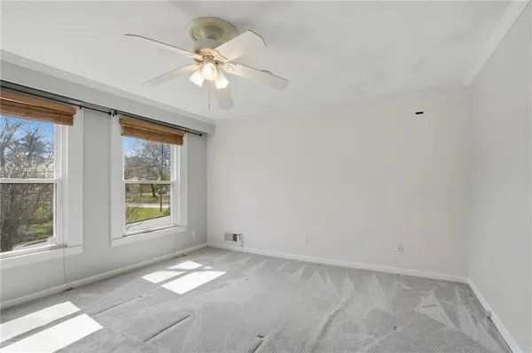 en empty room with a window