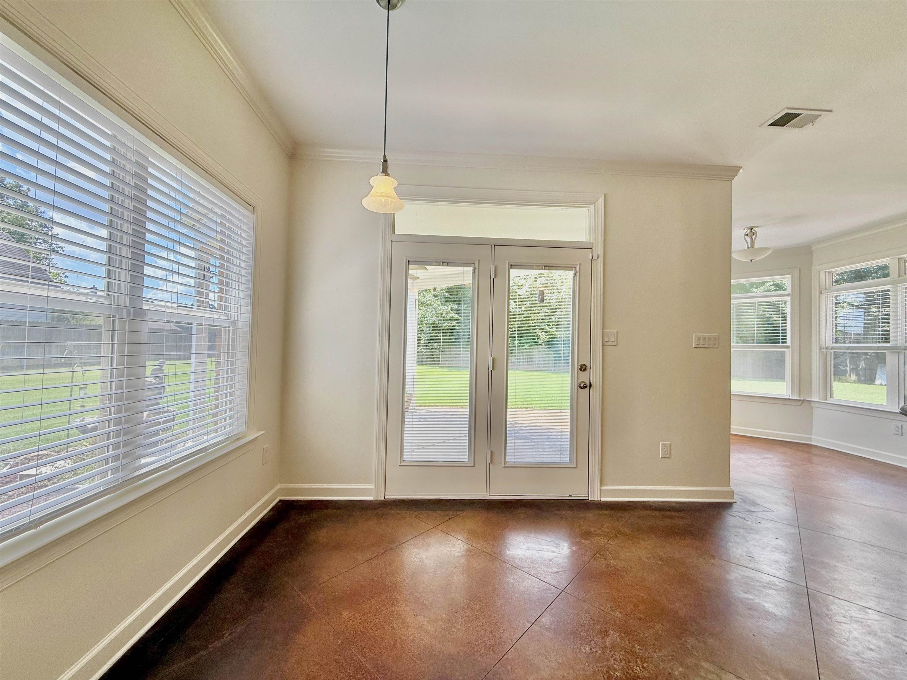 2620 Tomlin Road Somerville, TN 38068 - Photo 18 of 40 a view of an empty room with wooden floor and a window