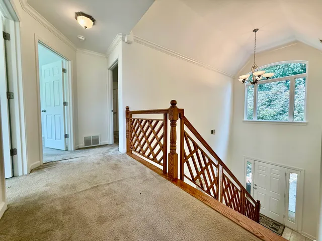 a swimming pool with a balcony