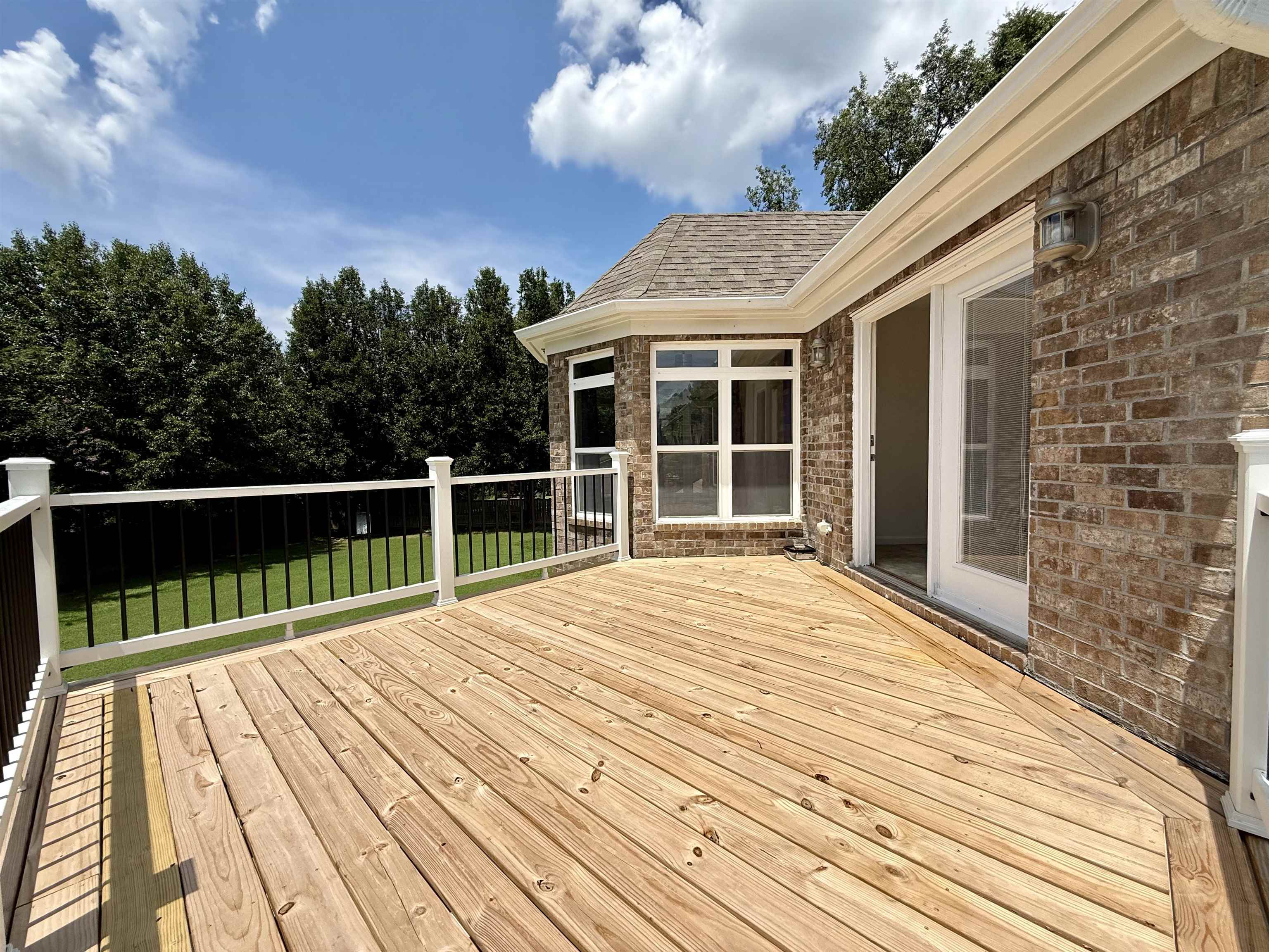 2620 Tomlin Road Somerville, TN 38068 - Photo 28 of 40 a view of a wooden chairs on a terrace
