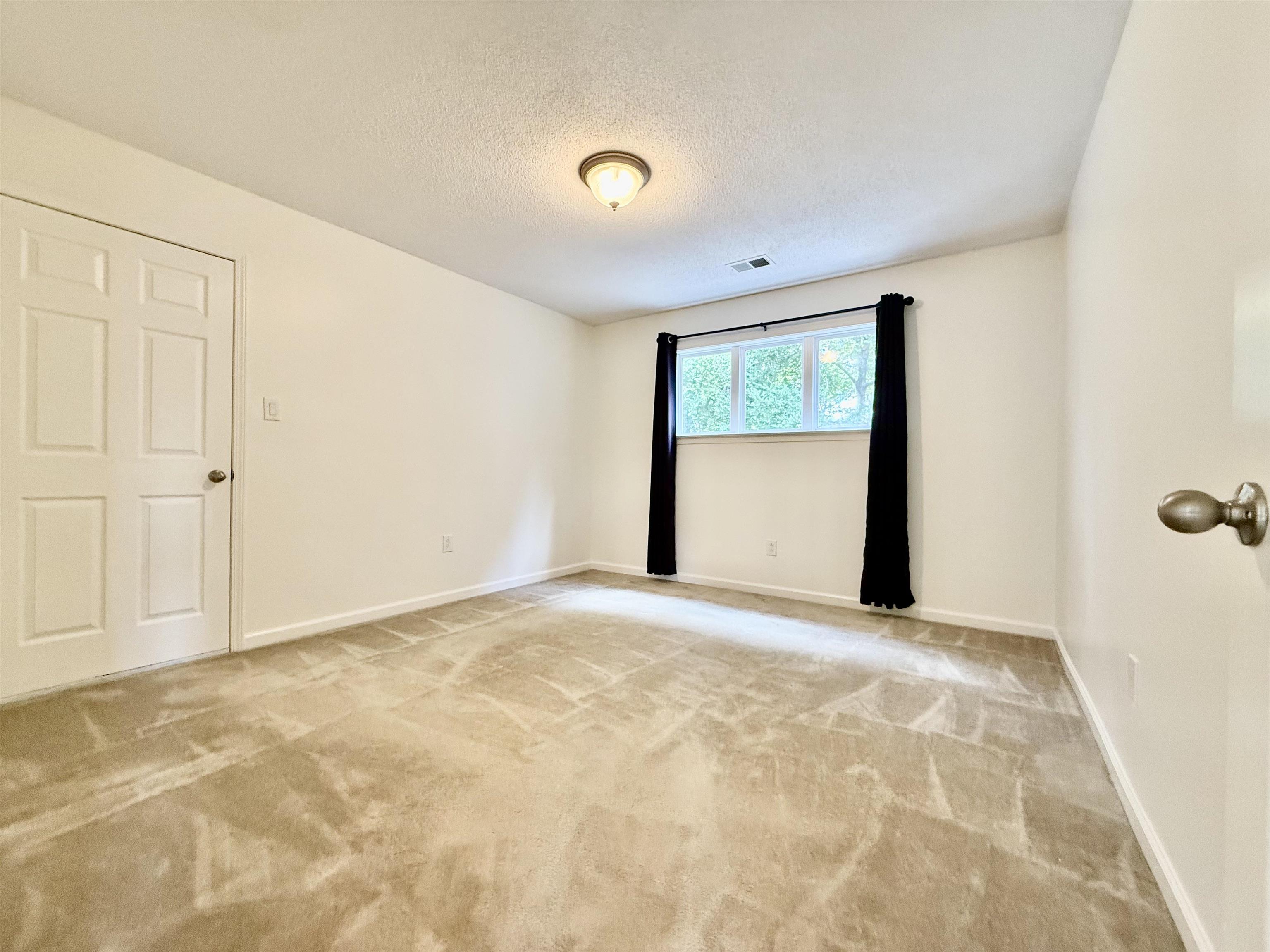 2620 Tomlin Road Somerville, TN 38068 - Photo 32 of 40 a view of an empty room with a window