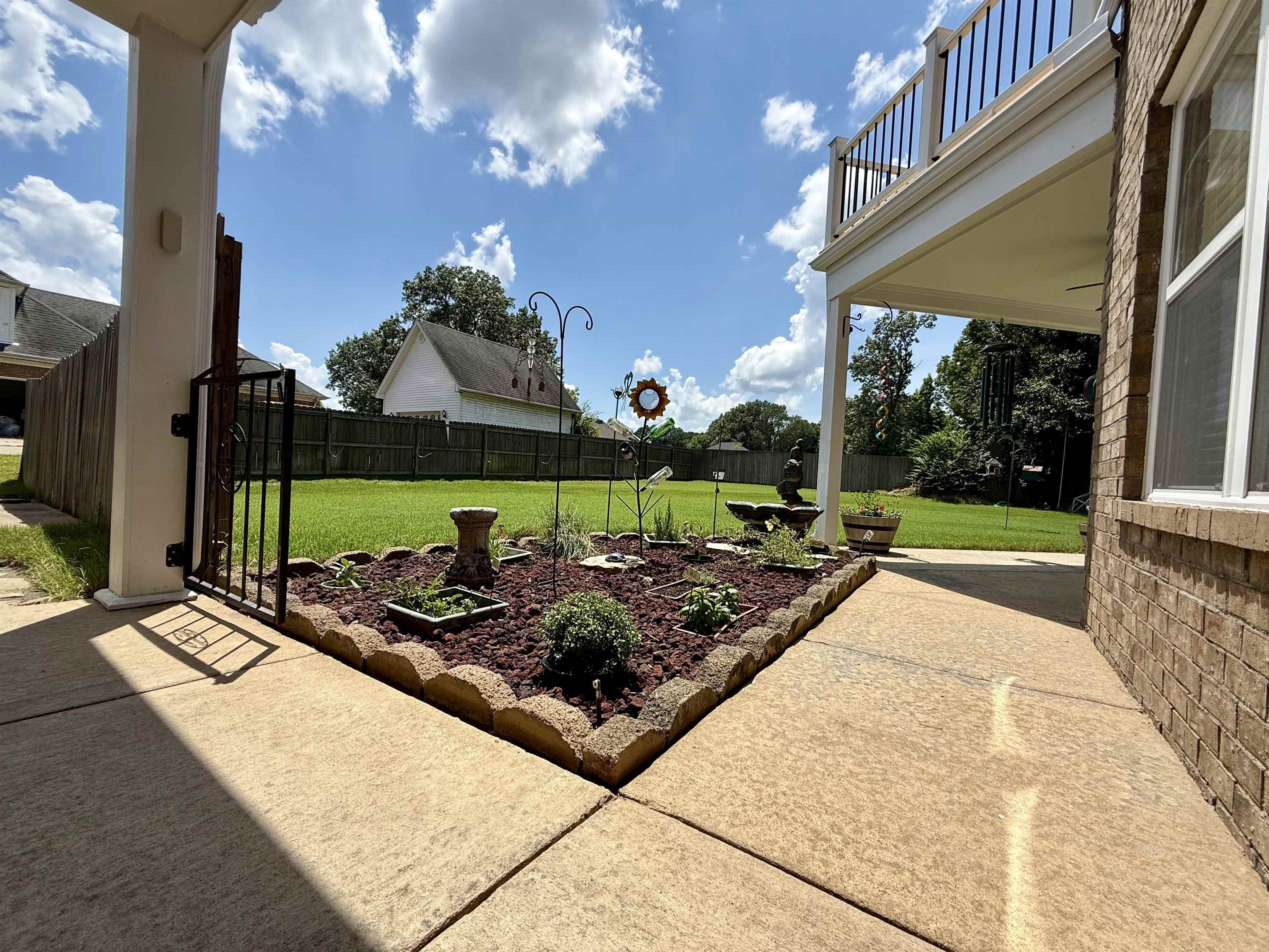2620 Tomlin Road Somerville, TN 38068 - Photo 36 of 40 a view of a house with backyard and sitting area