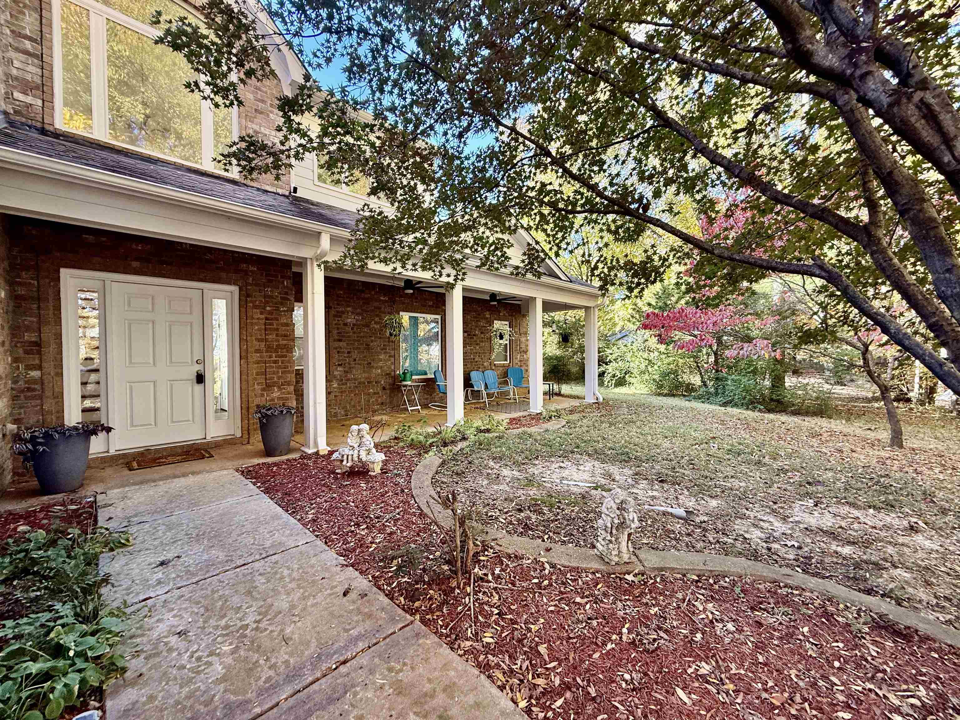 2620 Tomlin Road Somerville, TN 38068 - Photo 7 of 40 a front view of a house with a yard and garage
